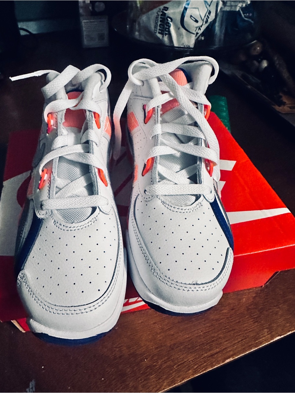 Nike Kids White Sneakers with Navy and Coral Highlights